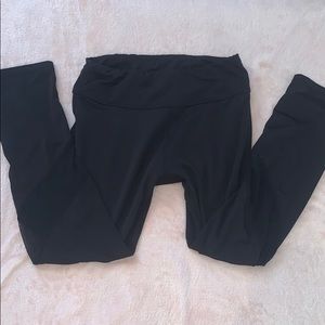 black athletic leggings with mesh parts